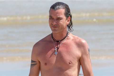 Gavin Rossdale shows off his fit physique during a solo day at the beach