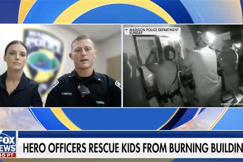 Indiana police officers revealed how they saved 6 people from a burning building