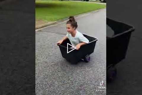 Two Girls make DIY go carts from Laundry Baskets to Race