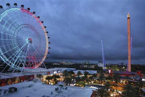 Orlando amusement park suspends ride where customers shoot targets while perched with laser guns