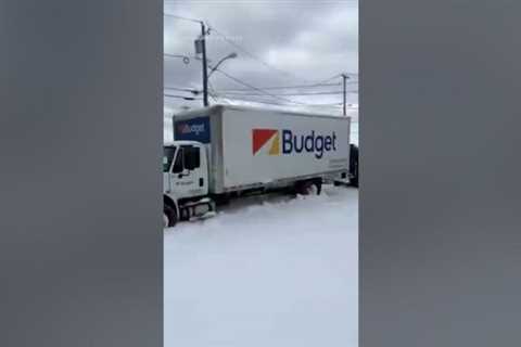 Police use armored vehicle to remove cars stranded in Buffalo snow