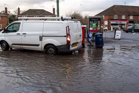 UK weather: Heavy rain batters Britain with fears power supplies could be affected as ice covers..