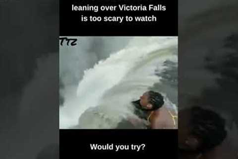 Viral video of woman leaning over Victoria Falls is too scary to watch! #shorts #viralshorts