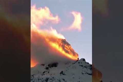 Snowy mountain looks like it's on fire!