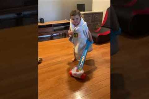 Baby dresses as an old lady and rage-cleans the house