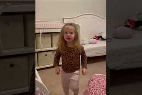 Adorable girl so excited about her big girl bed