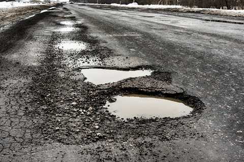 Motorists made 2,000 calls per day last month about damage from potholes