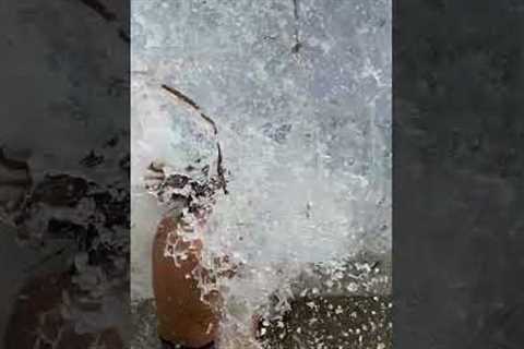 Girl Getting A Clip Recorded Hit By A Massive Wave