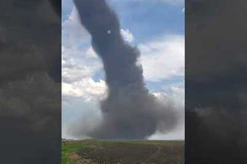 Massive tornado rips through field in Stettler, Canada