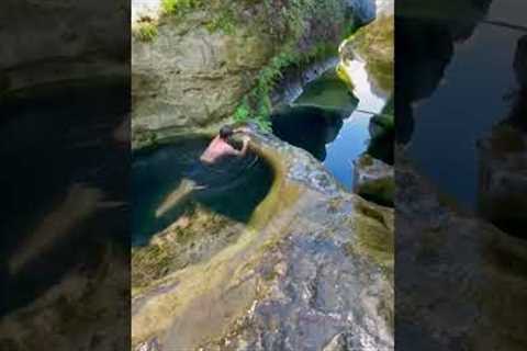 Guy swims through amazing natural pools