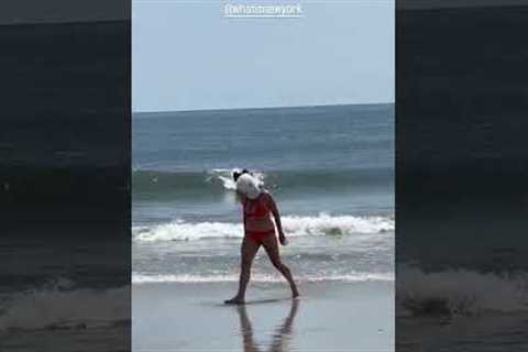 Woman wearing seagull mask has bizarre photoshoot