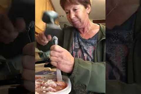 Funny grandma attempts to cut frozen meatballs