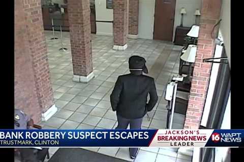 Clinton police release surveillance video of bank robbery suspect