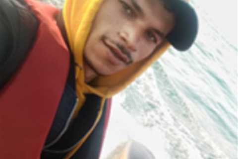 Man who posed for selfies as he piloted small boat with 50 migrants on board is jailed