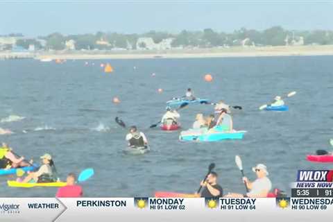 More than 100 swimmers compete in 4th annual Swim Across the Bay