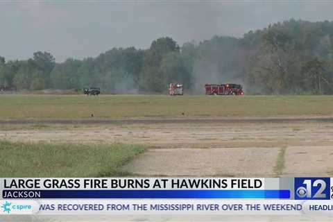 Large grass fire burns at Hawkins Field