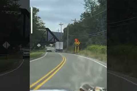 Truck Driver Ignores Low Clearance Warning