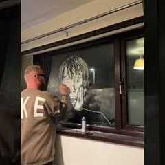 Man makes Kevin from Home Alone on the window of bathroom using shave foam
