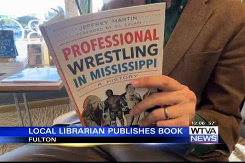 Local librarian publishes book about wrestling