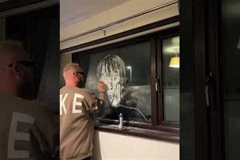 Man makes Kevin from Home Alone on the window of bathroom using shave foam