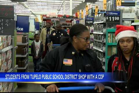 Students from Tupelo Public School District shop with a cop