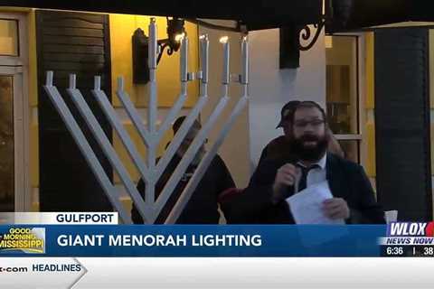 Giant menorah lit at Gulfport Premium Outlets