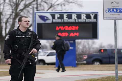 Iowa principal who risked life to protect students during a school shooting has died