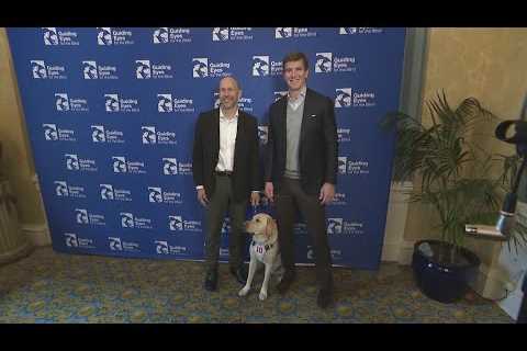 Eli Manning joins handoff of guide dog