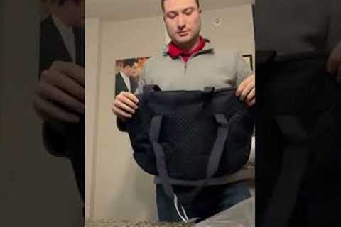 Wife receives funny video of husband modeling new bag