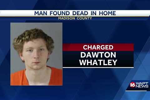 Man arrested after body found in Madison County