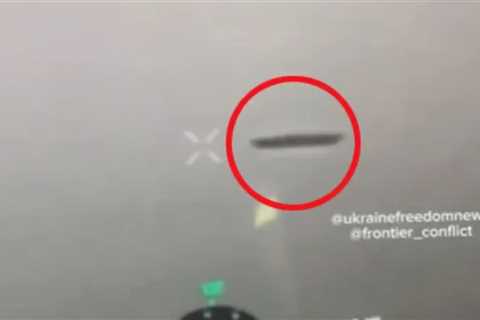 Shock video shows disc-shaped UFO floating over Ukraine warzone as ‘huge’ object spotted by drone