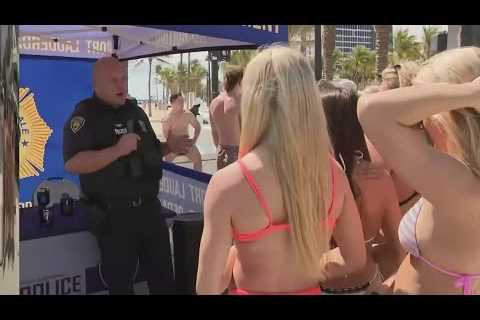 Police department recruiting on the beach during spring break