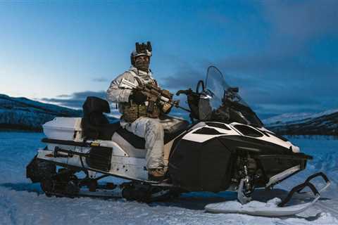 Brit Royal Marines to be kitted with £10m fleet of battlefield snowmobiles for behind-enemy-lines..