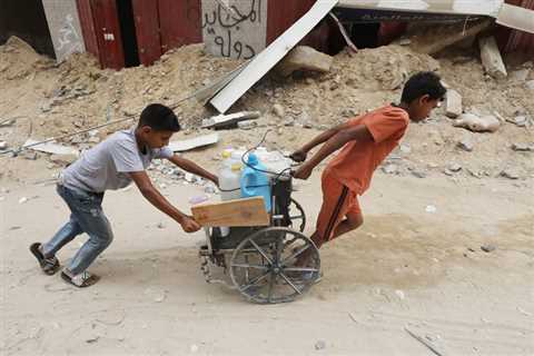 On beaches of Gaza and Tel Aviv, two tales of one heatwave