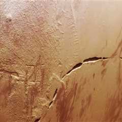 Mars-Orbiting Spacecraft Captures ‘Snaking Scar’ Across the Base of Enormous Volcano