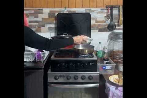 Woman Spills Shrimp Whilst Cooking