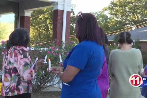 Care Lodge hosts candlelight vigil to honor domestic  violence victims